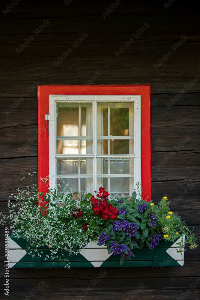Traditional window on a Styrian house Traditional window on a Styrian house