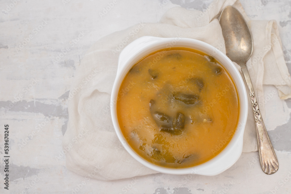vegetable soup with crackers in white bowl on ceramic vegetable soup with crackers in white bowl on ceramic