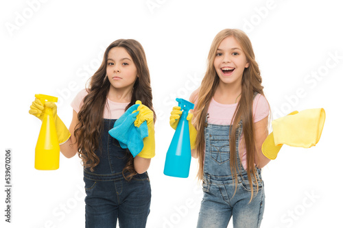 Maintaining hygiene services. Home hygiene. Happy cleaners preparing for home hygiene. Little girls holding spray bottles and cleaning wipers. Home cleaning and everyday hygiene