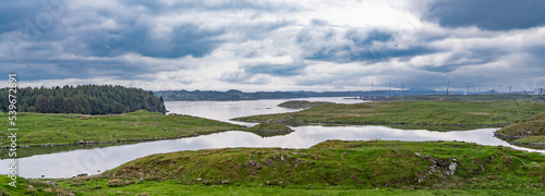 Panorama of the beautiful landscape of the island of Karmoy in Rogaland, Norway, with dark cloudy sky
