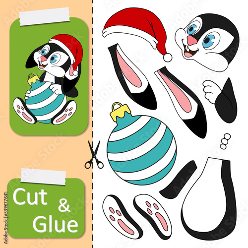 Cut and glue the paper game with rabbit in santa hat holding Chrismas Ball. Create application cartoon Rabbit as symbol of 2023 New Year. Kids logic game and activities jigsaw. Year of the Rabbit.