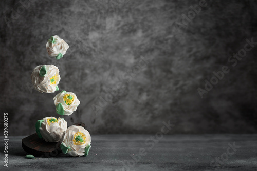 Traditional Russian homemade merengue marshmallow or zephyr flowers photo