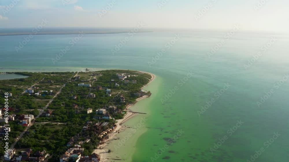 Aerial view over tropical Holbox Island with transparent water of Gulf of Mexico and Caribbean Sea in Summer Aerial view over tropical Holbox Island with transparent water of Gulf of Mexico and Caribbean Sea in Summer
