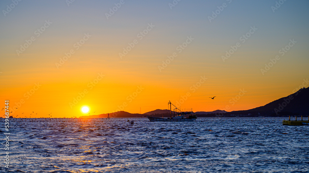 Sunset scenery with fishing boats and seagulls. Beautiful sea sunset and fish boat in Korea.
Scenery of fishing boats at Changhu-ri dock in Ganghwa-do, Incheon. Korean sea landscape. Korea's West Sea.