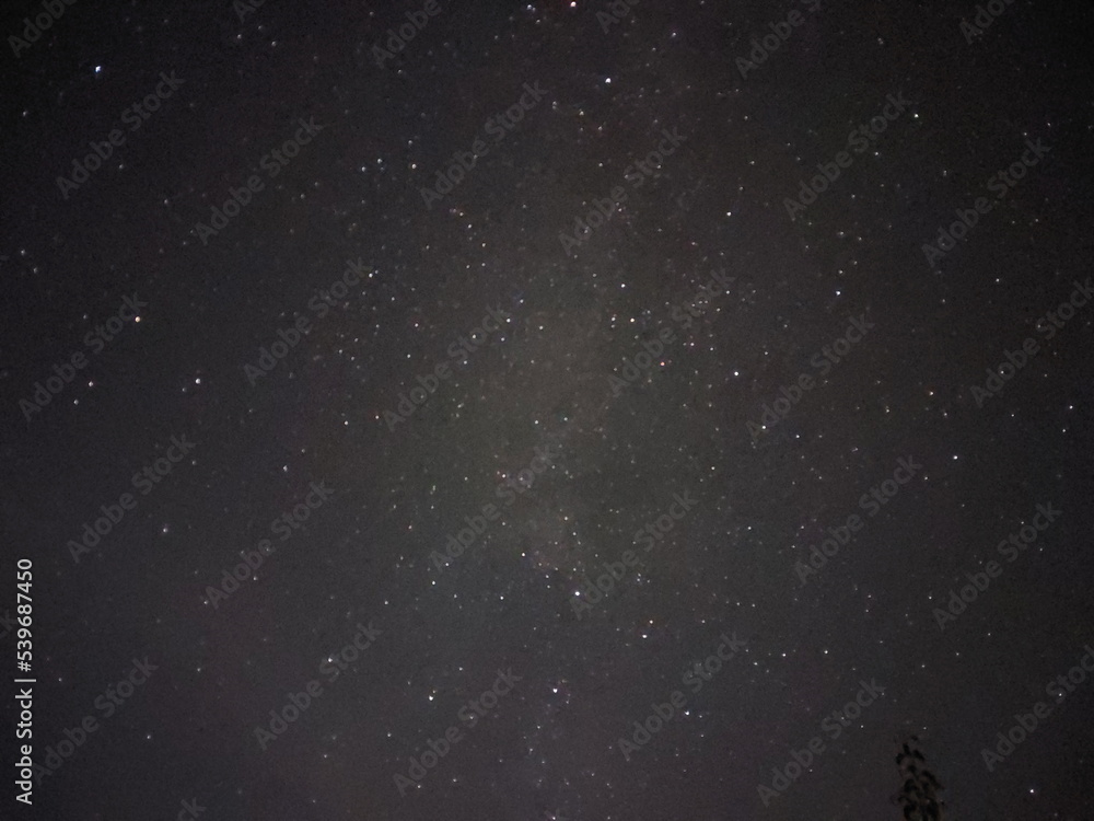 Fototapeta premium Bright night starry sky in the village