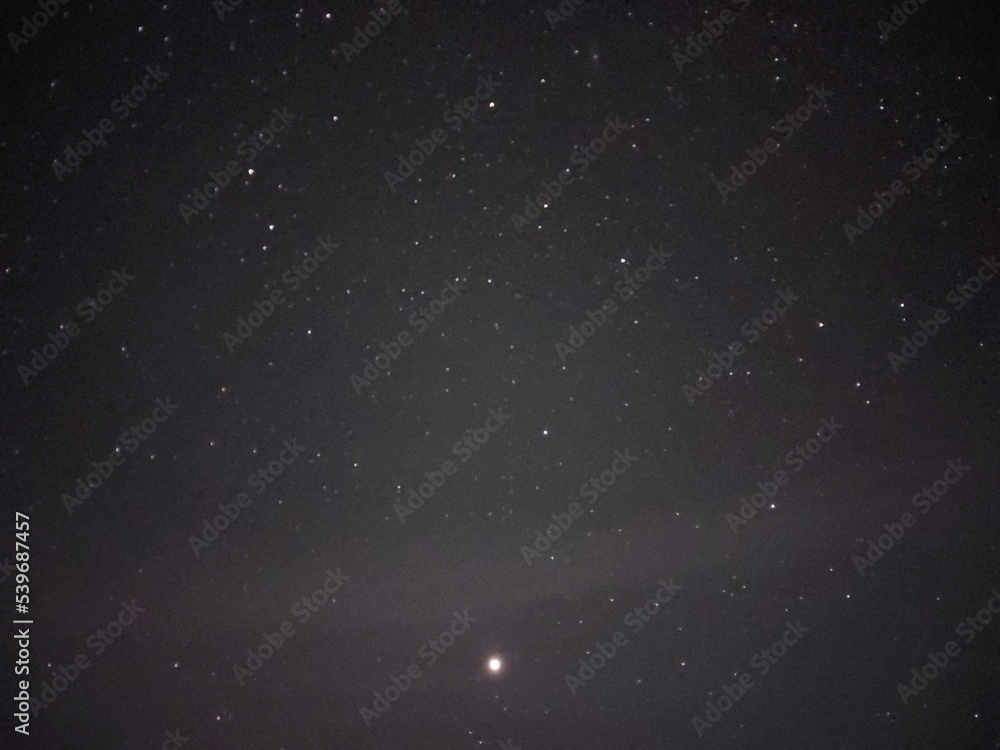 Fototapeta premium Bright night starry sky in the village