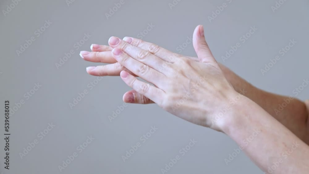 Moisturizing cream is applied to hands. Problematic skin, treatment of wounds on hands Moisturizing cream is applied to hands. Problematic skin, treatment of wounds on hands