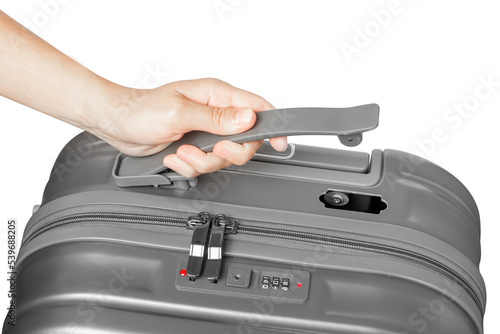 Broken travel suitcase. Broken bag handle. Suitcase without a handle