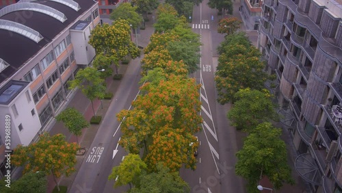 DMC DeLorean driving at the Avenue Ceramique in the city of Maastricht, Limburg, the Netherlands, seen from above in slomo. photo