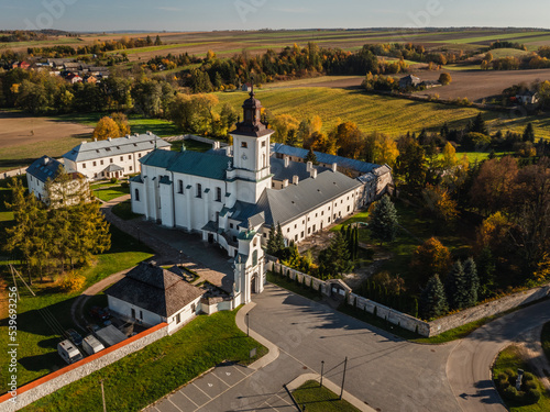 Imbramowice, Lesser Poland Voivodeship, Premonstratensian (Norbertine) monastery drone aerial shot, autumn day. photo