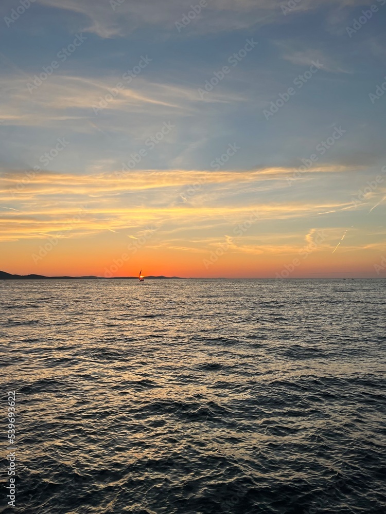 Beautiful orange sunset at the sea, natural colors, seascape background
