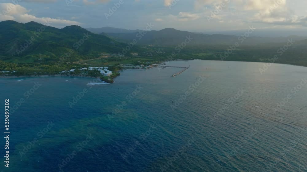 Aerial flight towards Bahía de Maimón a small resort town at Caribbean Sea in Puerto Plata Aerial flight towards Bahía de Maimón a small resort town at Caribbean Sea in Puerto Plata
