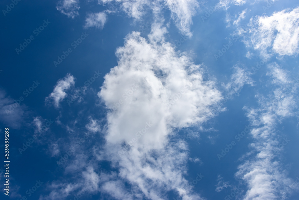 Beautiful bright blue sky and clouds background Beautiful bright blue sky and clouds background
