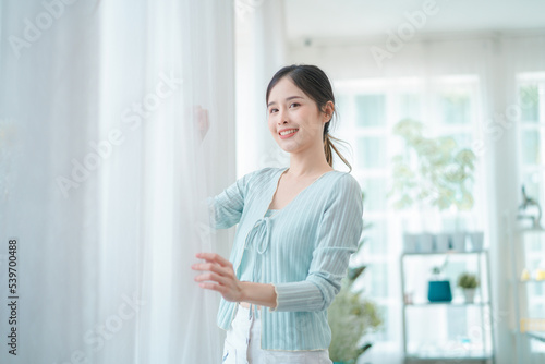 Free Download portrait of beautiful young asian woman, Closeup face of a pretty asian model looking at camera. - GFXLoad