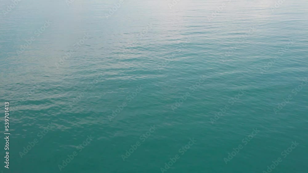 drone video flight over ocean, sea. Close to the water