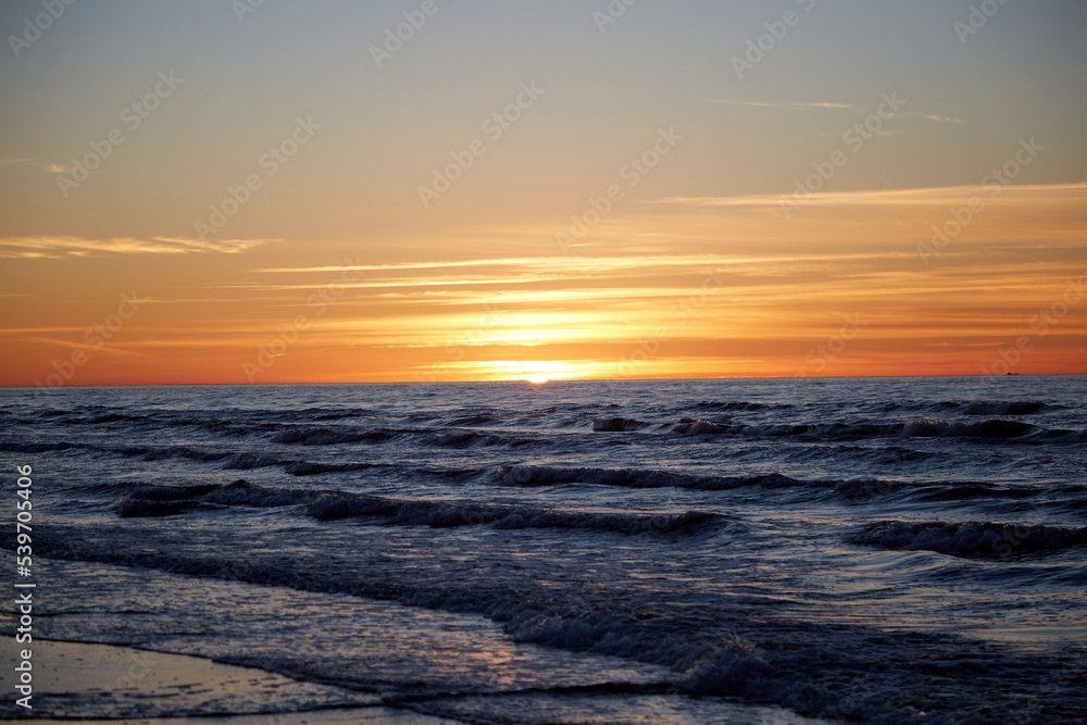 View on a sunset under the sea, seaside selective focus