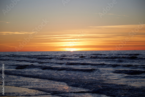 View on a sunset under the sea, seaside selective focus © Anna