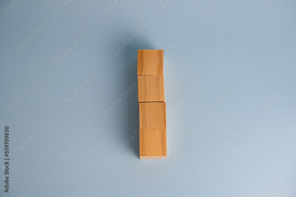Four blank wooden block cubes on background for your text. Business concept template and banner. Four blank wooden block cubes on background for your text. Business concept template and banner.