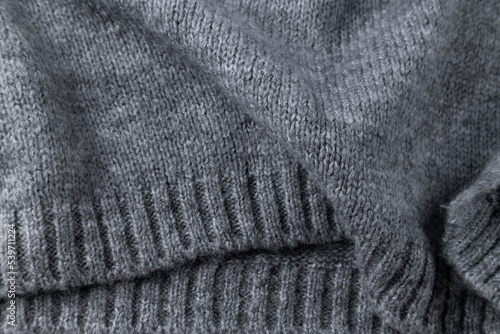 Woolen grey cloth, ondulate textile close up view