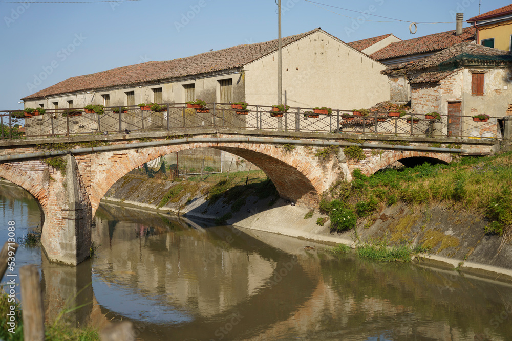 Old buildings along a canal near Badia Polesine