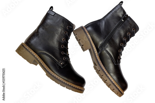 Autumn and winter women's black ankle boots isolated on a background.