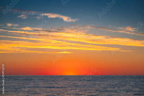Beautiful sunrise over the sea water