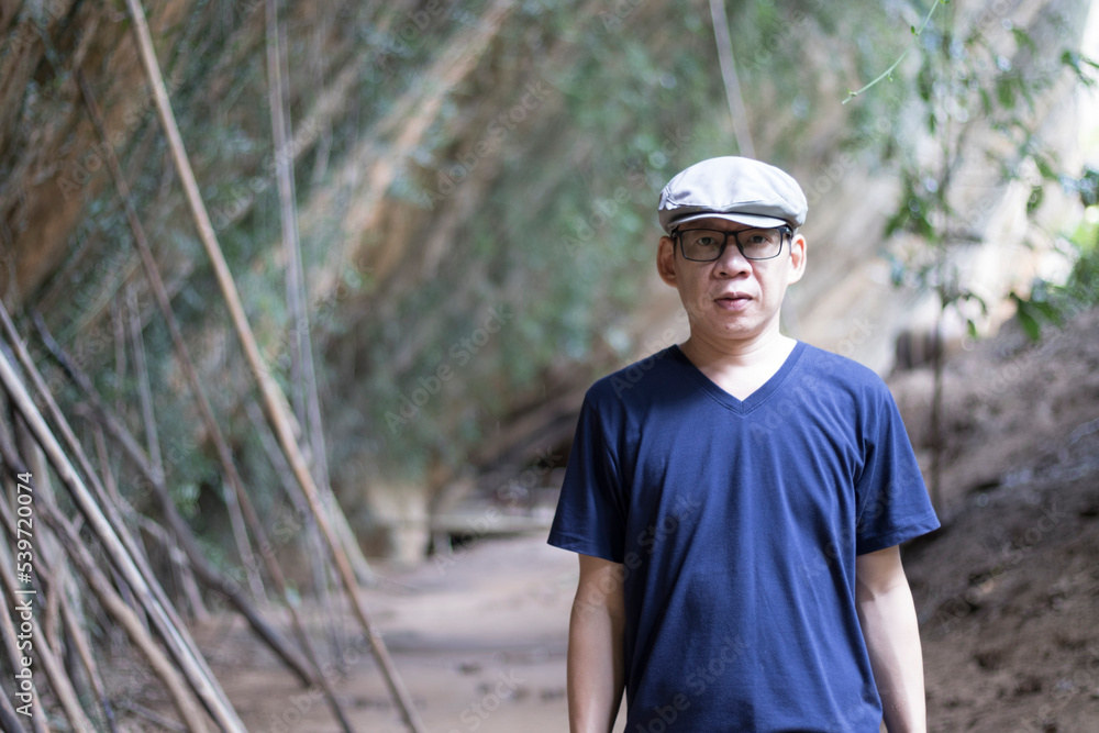 Portrait shot of an attractive man looking man with handsome having a nice time outdoors in the forest and cave relaxing, happy, leisure, activity,
having fun solo travel concept with the vacation. Portrait shot of an attractive man looking man with handsome having a nice time outdoors in the forest and cave relaxing, happy, leisure, activity,
having fun solo travel concept with the vacation.