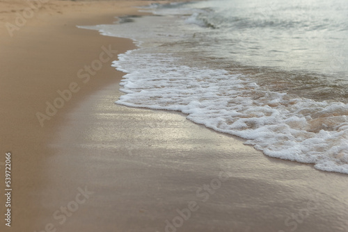 Beautiful beach with the smooth foam of sea in the morning of Rayong province Thailand