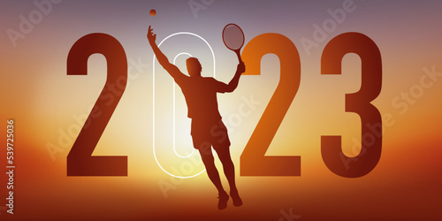Concept du sport sur le thème du tennis pour une carte de vœux 2023, montrant un tennisman faisant un service.