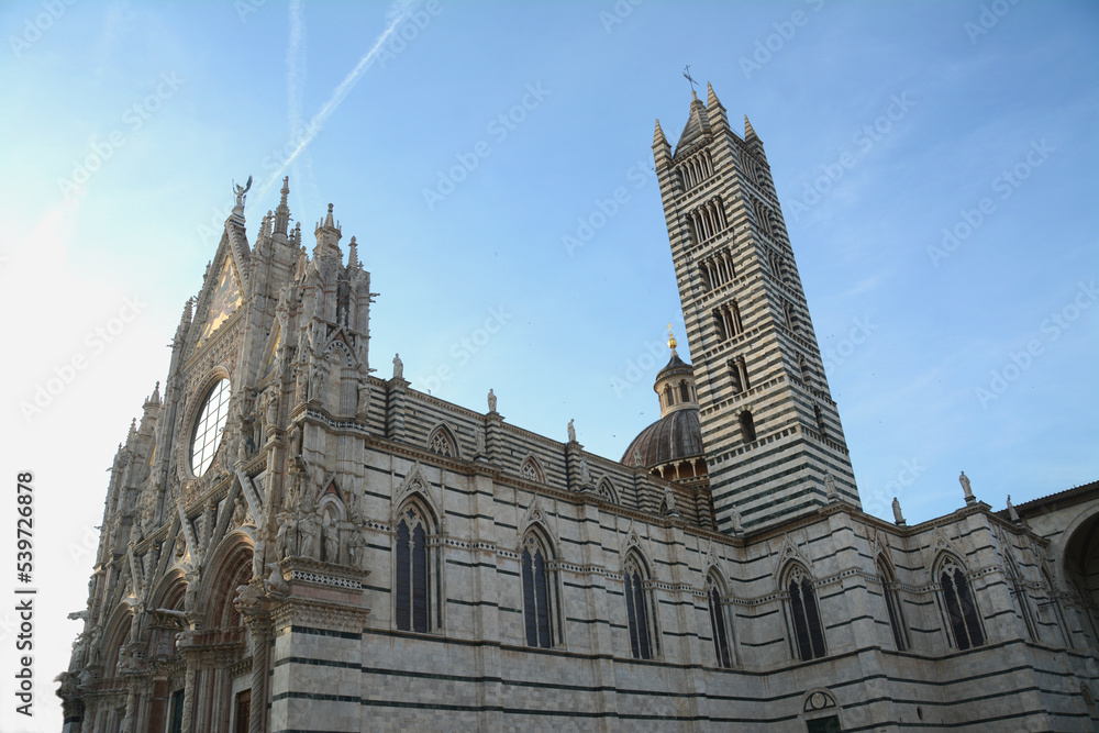 The cathedral of Siena Santa Maria Assunta is built in the Italian Romanesque-Gothic style and is one of the most beautiful churches built in this style in Italy