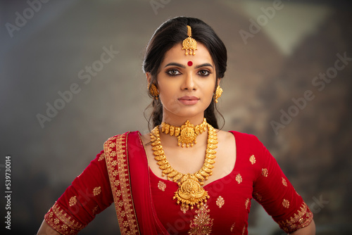 Photography Pretty Indian young Hindu Bride portrait in studio light.