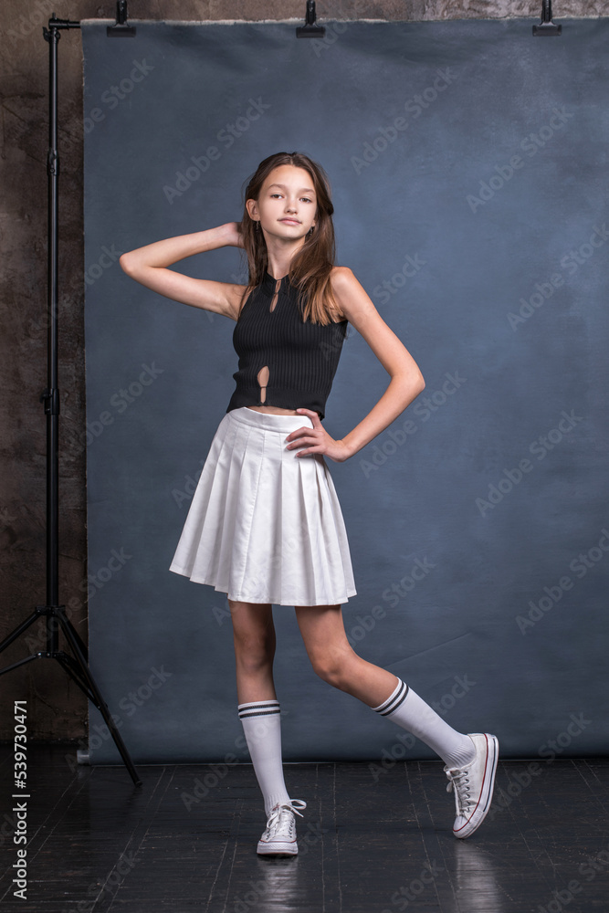 Studio portrait of a young teen girl