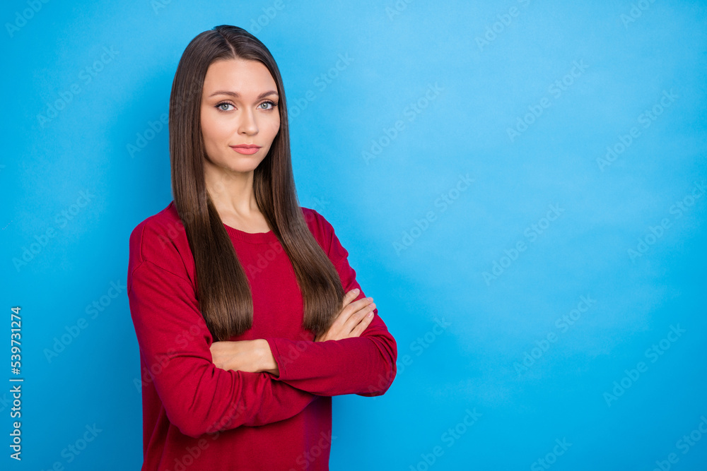 Photo of bossy millennial lady crossed arms wear burgundy shirt isolated on blue color background Photo of bossy millennial lady crossed arms wear burgundy shirt isolated on blue color background