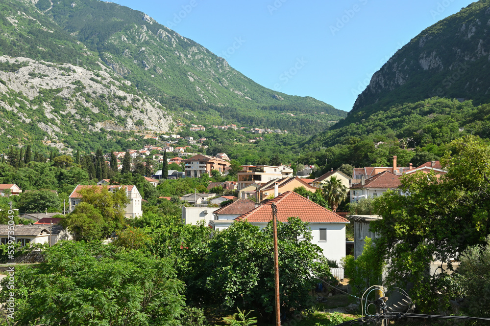 Houses located in the valley between the mountains in the town of Kotor. Montenegro