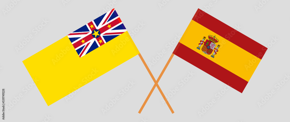 Crossed flags of Spain and Niue. Official colors. Correct proportion