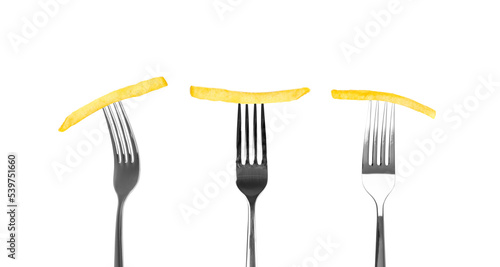 French Fries on Forks Isolated, Fried Potato Sticks with Skin, Golden Fries on Fork