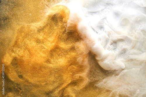 Golden sparkling abstract background, luxury white smoke, acrylic paint underwater explosion, cosmic swirling ink