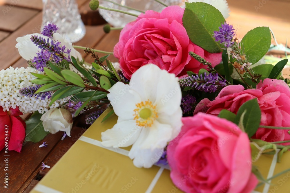 Obraz premium A bunch of pink flower on book 