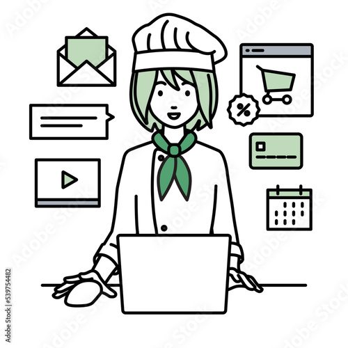 デスクで座ってPCでネットショップやマーケティングの仕事をしている調理師の女性