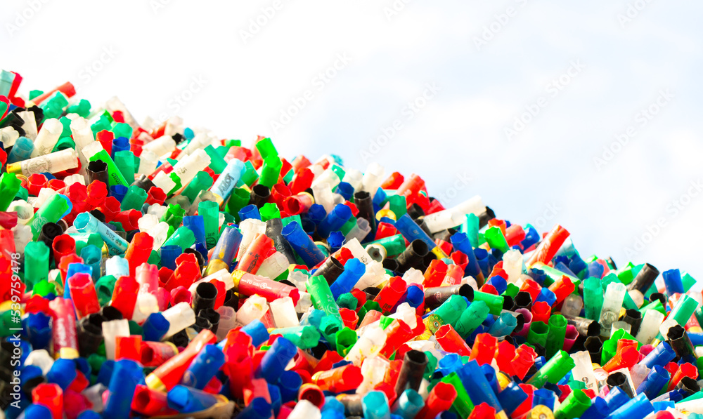 Bench Shells Shotgun shells in abundance as a background. Pile of cartridges close ...