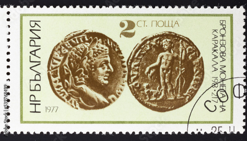 Postage stamp 'Bronze coin of Emperor Caracalla' printed in Bulgaria. Series: 'Old Coins', 1977