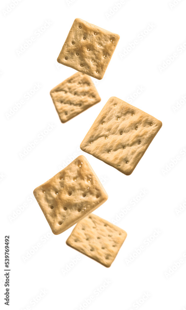 Flying group of dry crackers isolated on white background with shadow Flying group of dry crackers isolated on white background with shadow