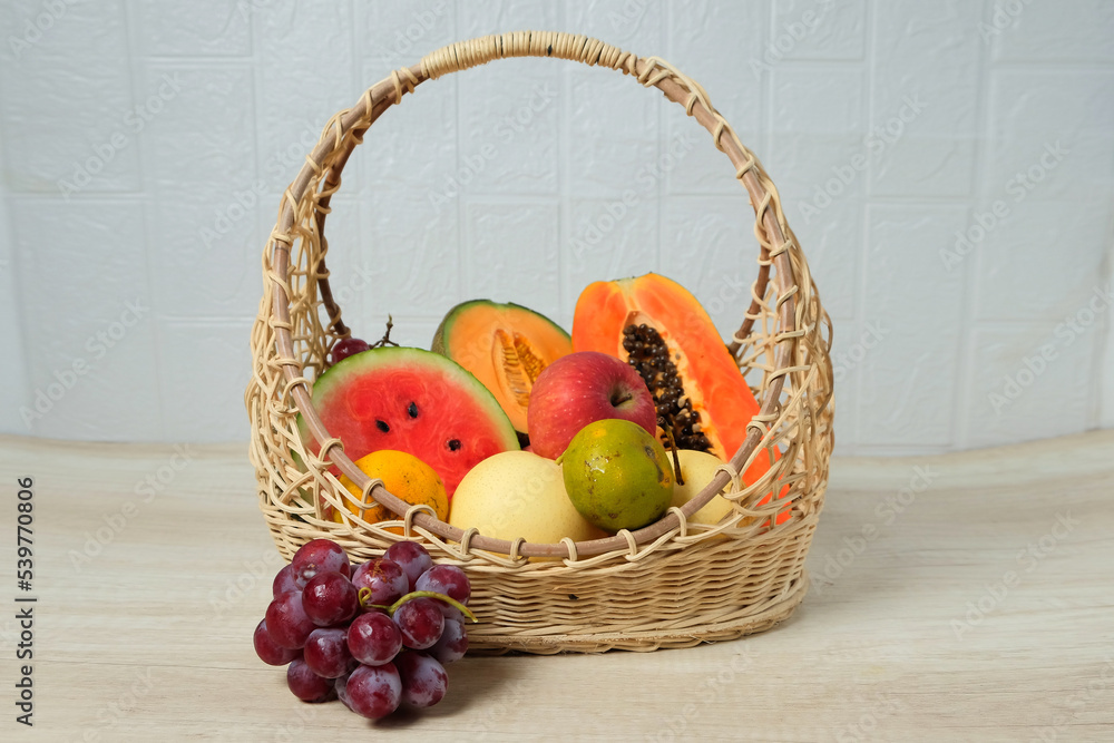 Assorted fresh fruit in basket. Summer fruit set Assorted fresh fruit in basket. Summer fruit set