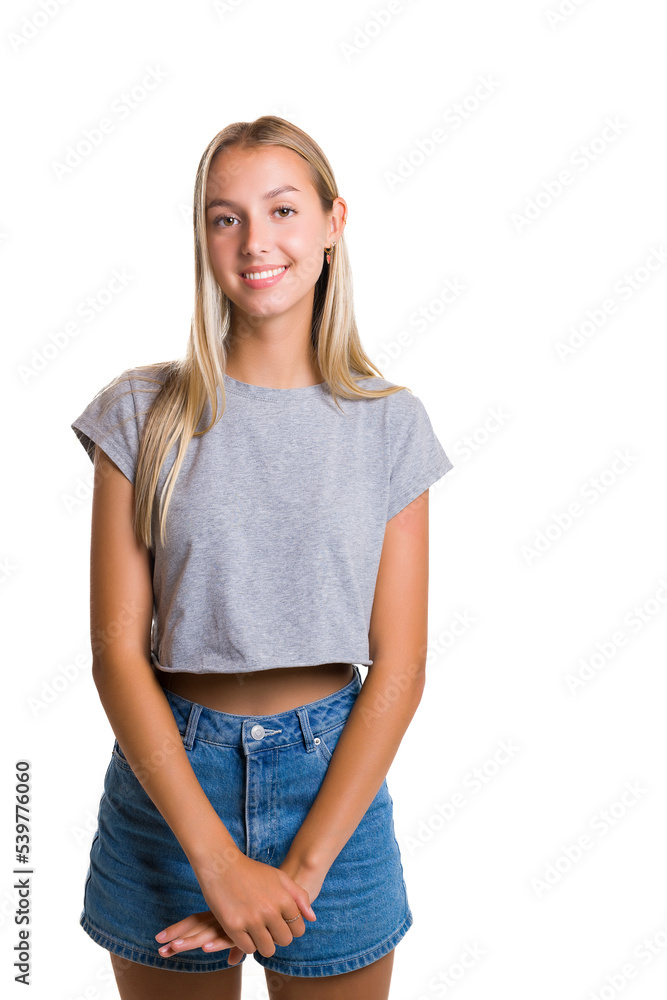 Fototapeta premium Portrait of young beautiful cute girl smiling looking at camera over white background.