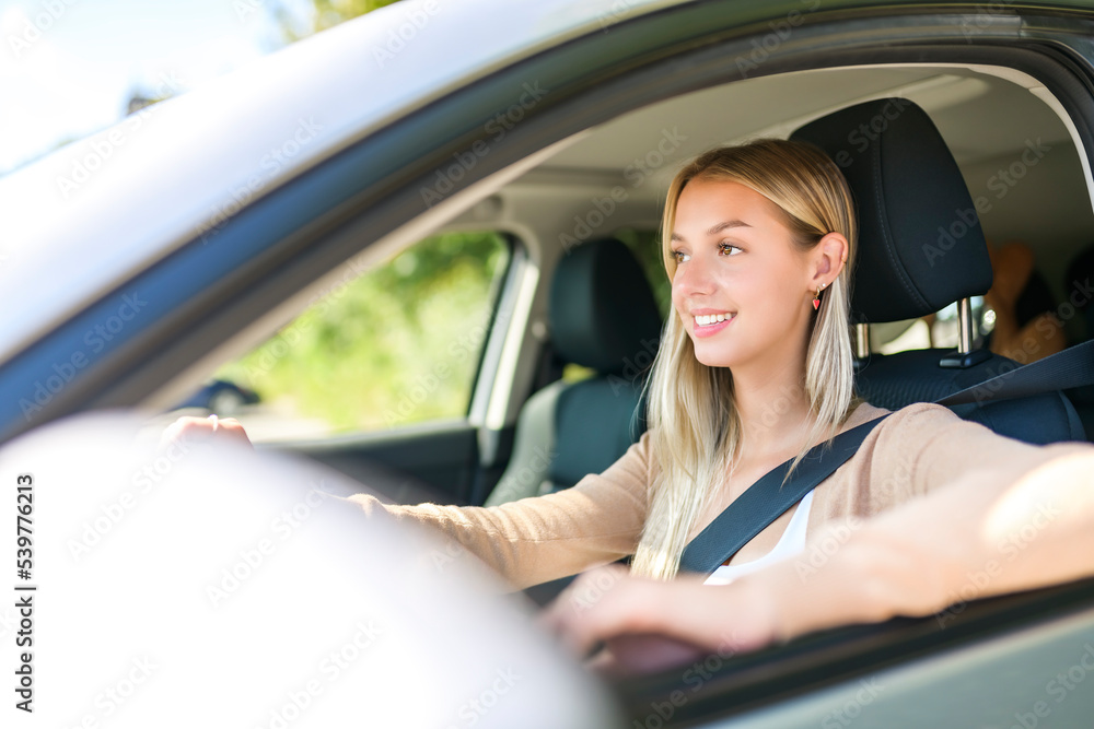 car driver woman happy owner of a new car