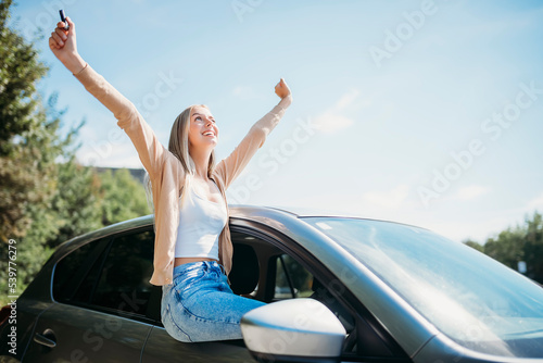 car driver woman happy owner of a new car
