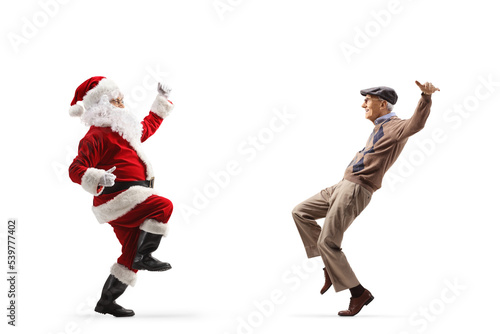 Full length profile shot of happy Santa Claus dancing with an elderly man