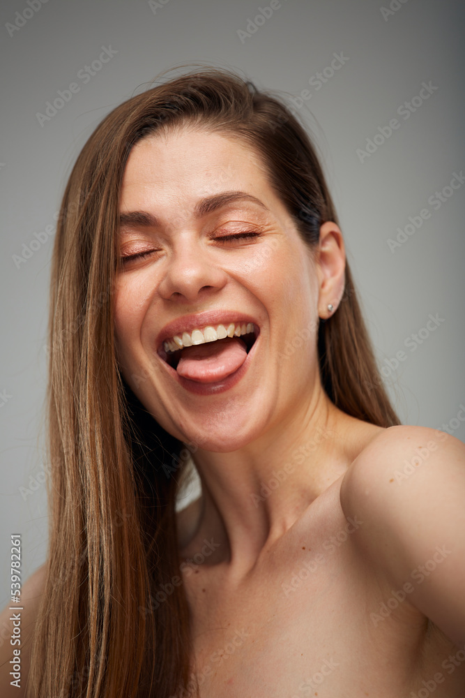 Beauty style portrait of funny laughing woman with closed eyes. Isolated studio advertising portrait. Beauty style portrait of funny laughing woman with closed eyes. Isolated studio advertising portrait.