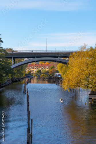 Bridges over the canal Pålsundet, canoer, a sunny color full autumn day in Stockholm