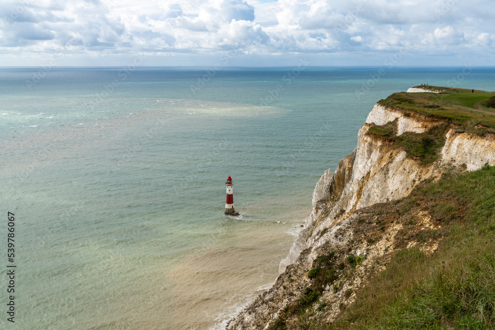 the Beachy Head Lighthouse in the English Channel and the white cliffs of the Jurassic Coast